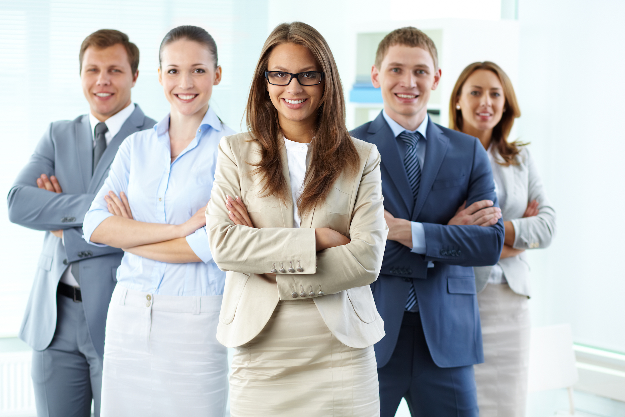 Group of 5 employees in an office